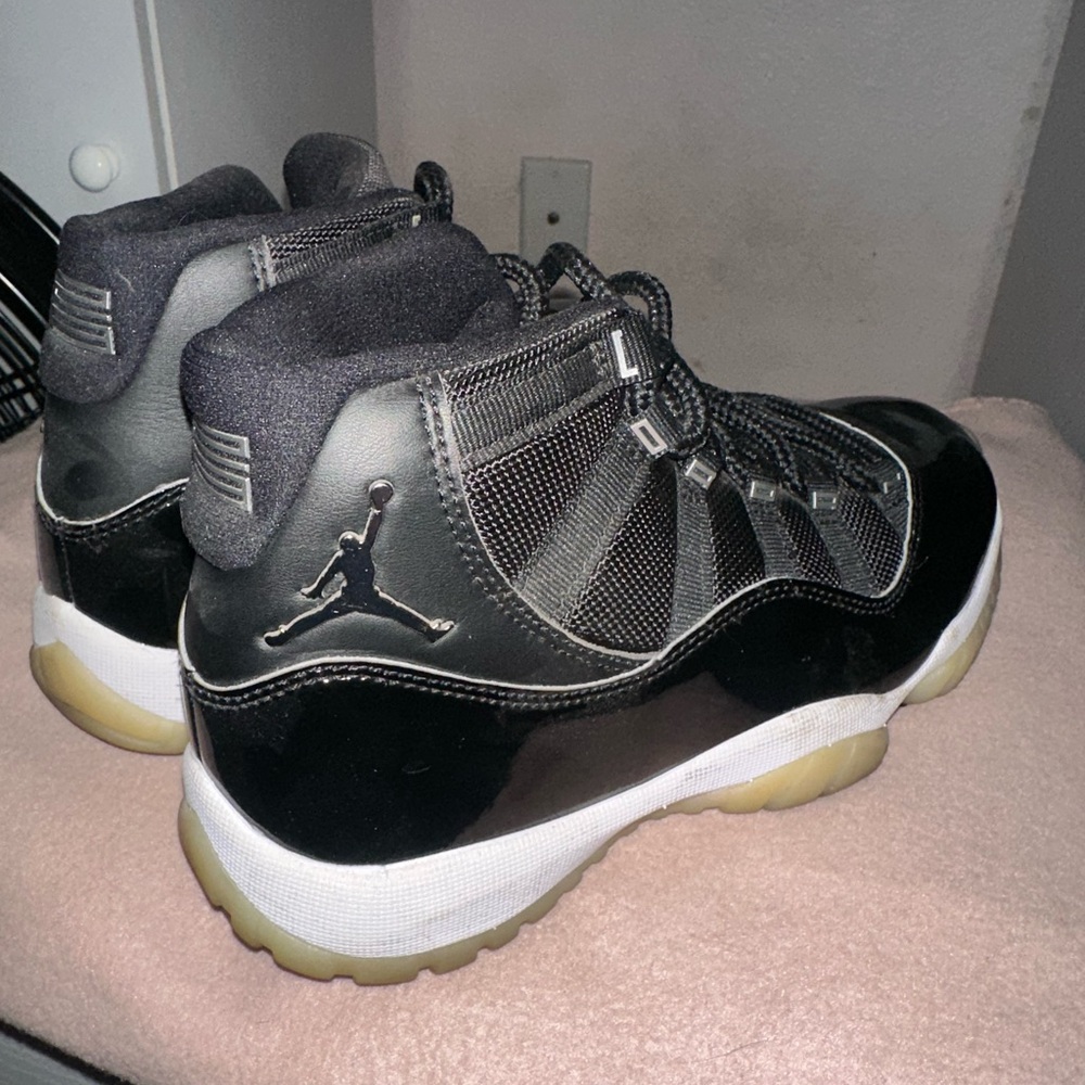 Jordan 11 Retro Black and White High-Top Sneakers